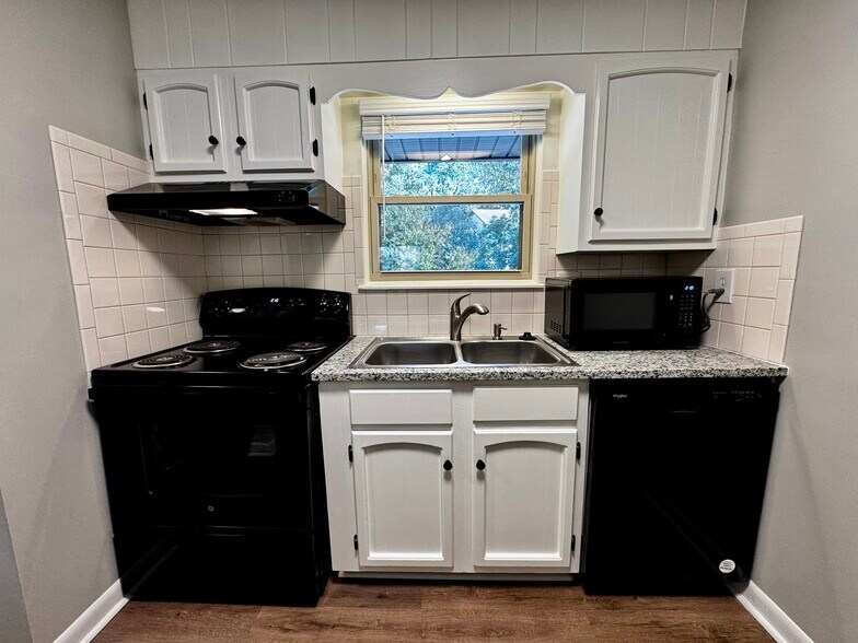 Kitchen looking out condo - 122 Turnwood Ln