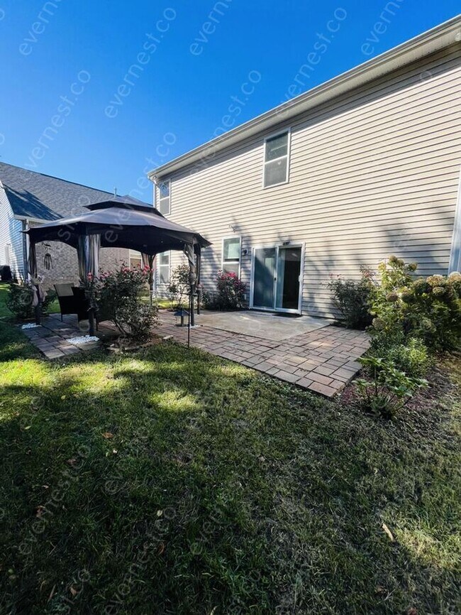 Building Photo - Spacious 5-Bedroom Home with Modern Amenit...