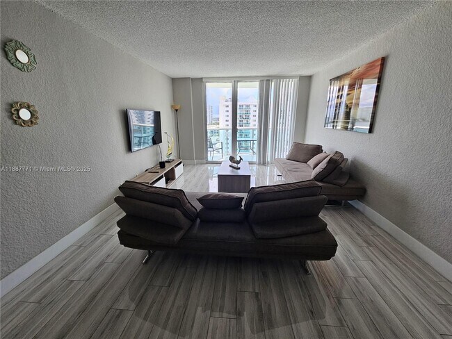 Building Photo - 19370 Collins Ave