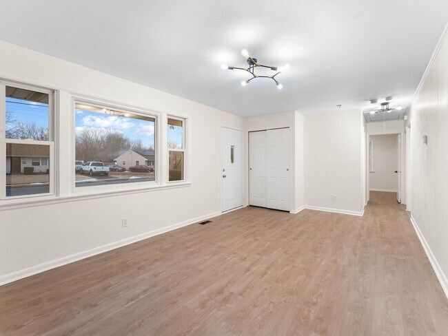 Building Photo - Fully Renovated 4-Bedroom Home with Large Fenced Yard in Clayton