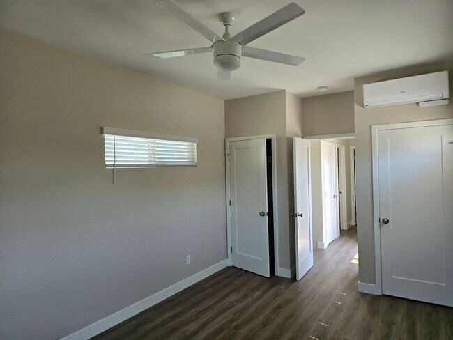 Building Photo - NEW 4BD/2BA, Large Balcony!!