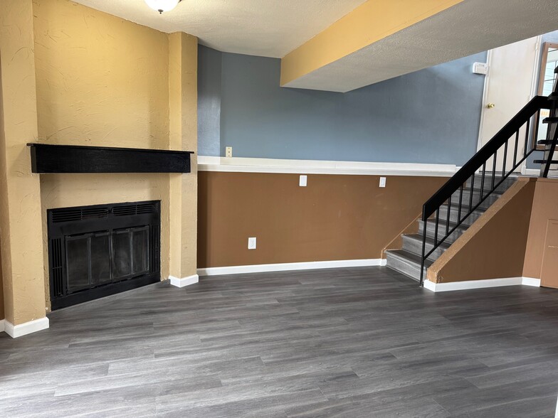 Downstairs Living Room Fire Place - 7504 Liberty Bell Dr