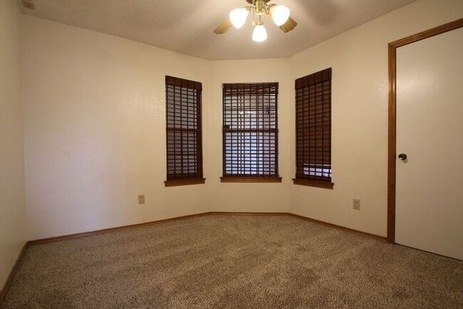 Building Photo - Corner Lot Charmer Off Chapel Creek | 4BR/2BA with Fireplace, Garden Tub & Fenced Backyard