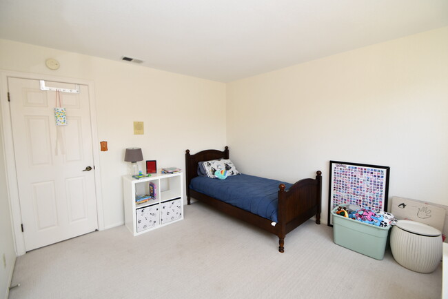 One of four bedrooms upstairs. - 1920 Havemeyer Ln