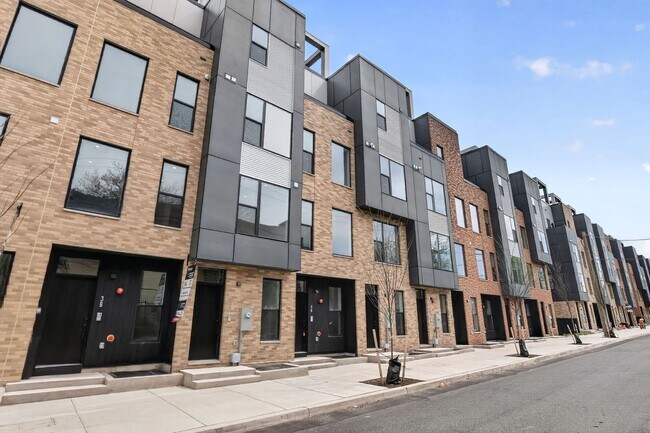 Building Photo - Garage parking, private outdoor space, and skyline views—this Northern Liberties home checks ever...