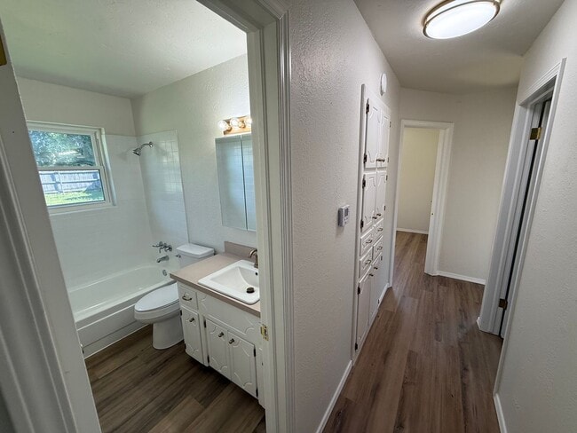 Building Photo - Brand new appliances, flooring, paint, and...