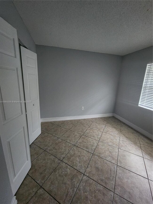 Building Photo - 10960 NW 29th Ct