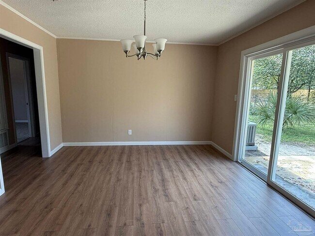 Building Photo - 7845 Le Jeune Dr