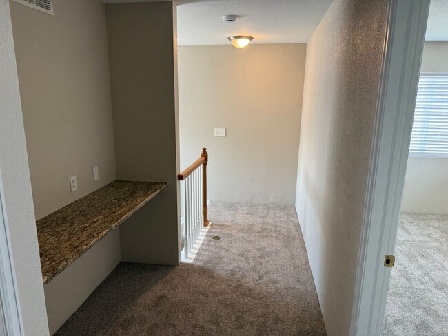Building Photo - Spacious 4-bed, 3-bath home on a quiet cul-de-sac — no lawn maintenance required.