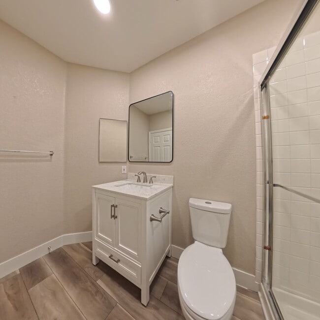 Building Photo - Beautifully Renovated 2nd-Floor Condo in Prime Location