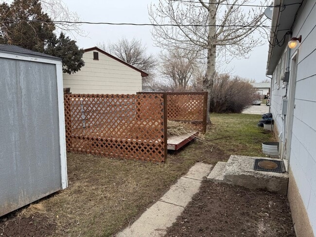 Building Photo - 4 Bedroom 2 Bathroom Home on Large Corner Lot with 2 Car Attached Garage In Great Neighborhood In...