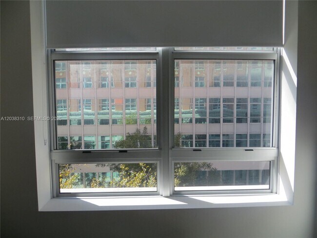 Building Photo - 111 E Flagler St