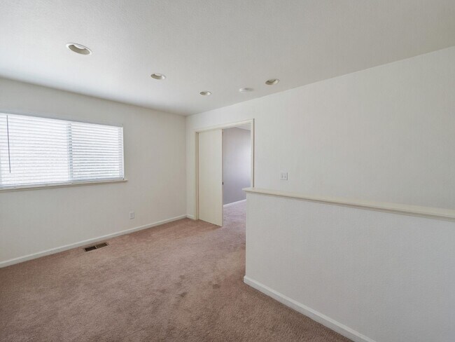 Building Photo - Spacious 4-Bedroom Home with Solar, Finished Garage, Large Pantry & Low-Maintenance Backyard in M...