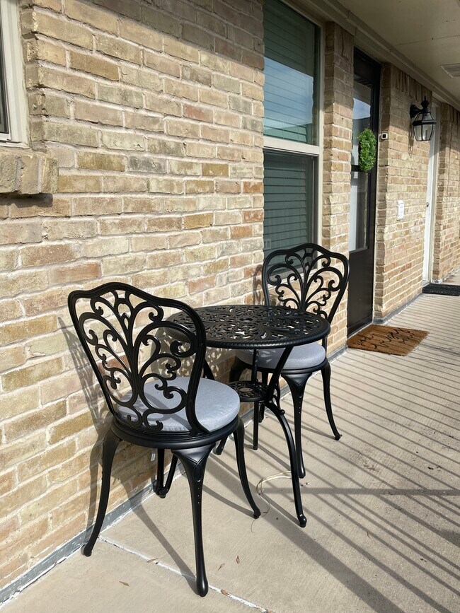 French style patio furniture go with condo. - 7718 Royal Ln