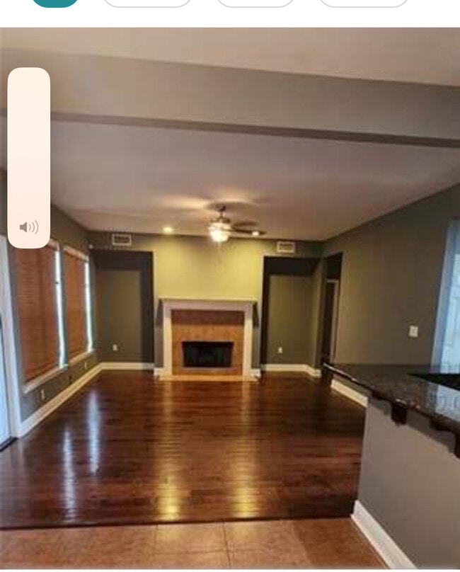 Fireplace, den with large windows. - 39152 Cajun Bayou Ave