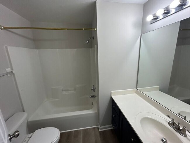 Building Photo - **Spacious 4-Bedroom Home with Walk-In Clo...