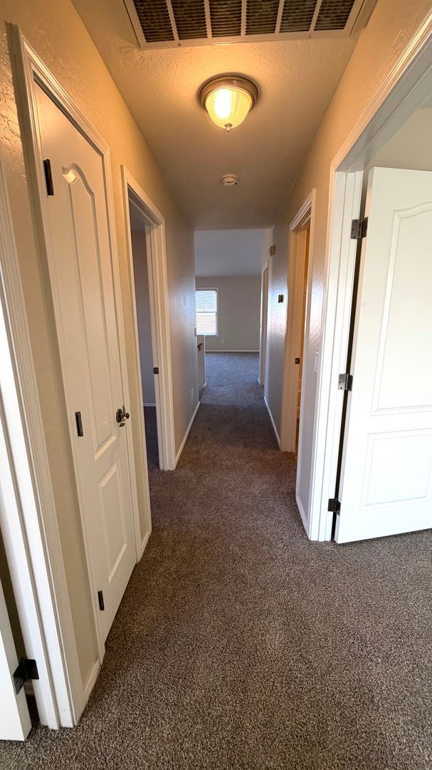 Building Photo - Spacious Surprise home with large backyard