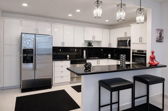 Building Photo - 19380 Collins Ave