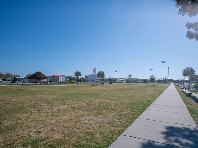 Building Photo - OFF-SEASON MONTHLY BEACH LIVING AWAITS!