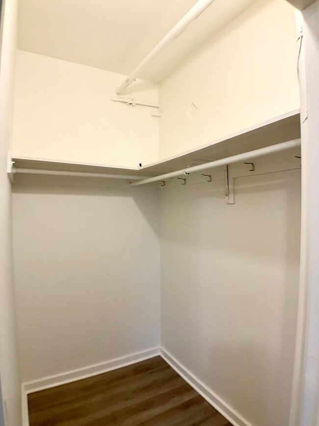 Building Photo - RENOVATED and Private. DISHWASHER, ON-SITE LAUNDRY, HARDWOOD!