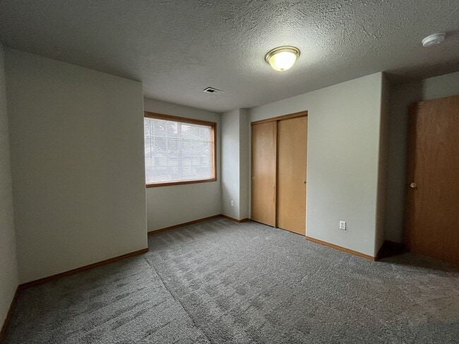 Building Photo - 3-Bed Home with Fireplace, Fenced Backyard, 2 Car Garage & Front Patio!