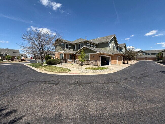 Building Photo - "Spacious 2-Bed Condo with 2.5 Baths in Aurora – Your Dream Home Awaits