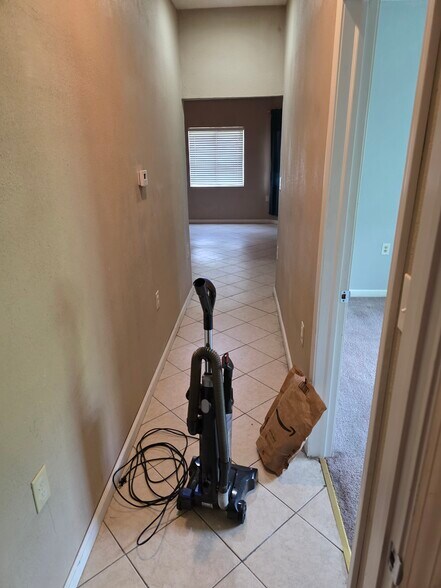 Hall to front room - 521 E 7TH AVE