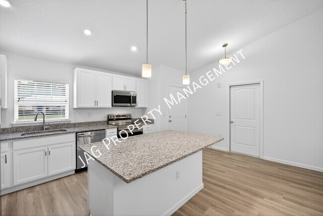 Building Photo - 615 Chaloupe St SE