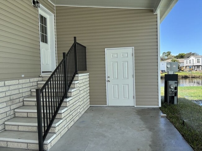 Building Photo - 5647 Blue Harbor Dr