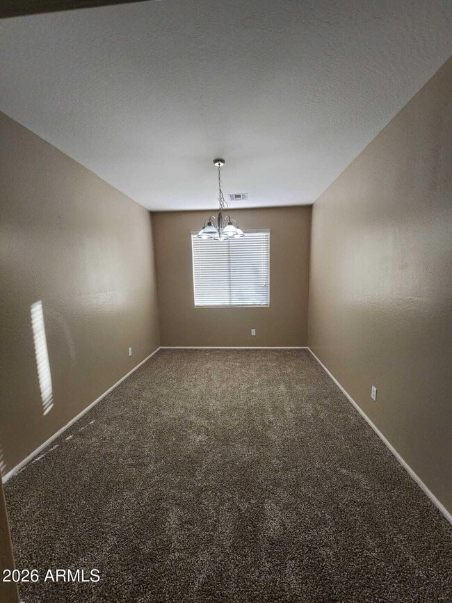 Building Photo - 7643 W Charter Oak Rd