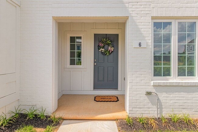 Building Photo - Modern 2025 Townhome | Open-Concept Living, Chef’s Kitchen with Large Island & 2-Car Garage