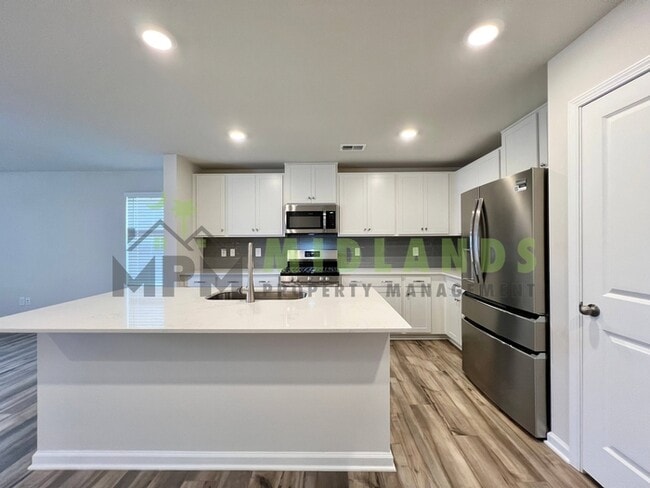 Building Photo - 1221C Champions Rest