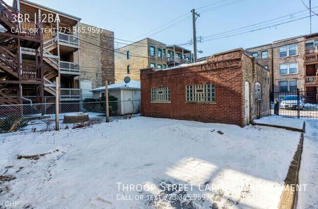 Building Photo - 6148 S Vernon Ave