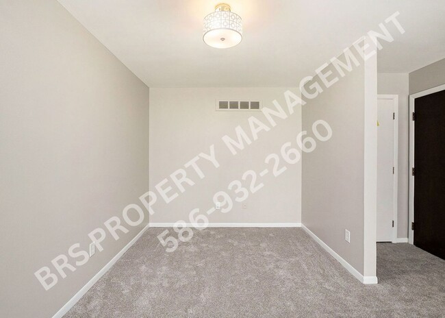 Building Photo - Charming 2-Bedroom Condo in Clinton Twp. –...