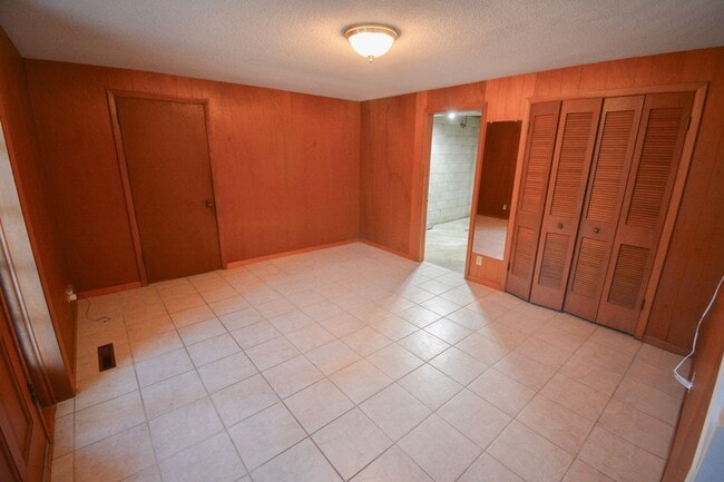 Building Photo - 4 Bed, 2 Bath Home for Rent – Unique Design & Retro Charm