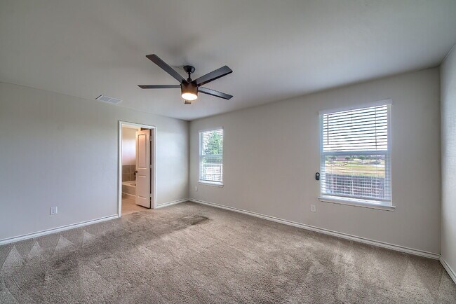 Building Photo - Welcome to this beautifully maintained 4-bedroom, 2-bathroom home in the highly desirable Whisper...