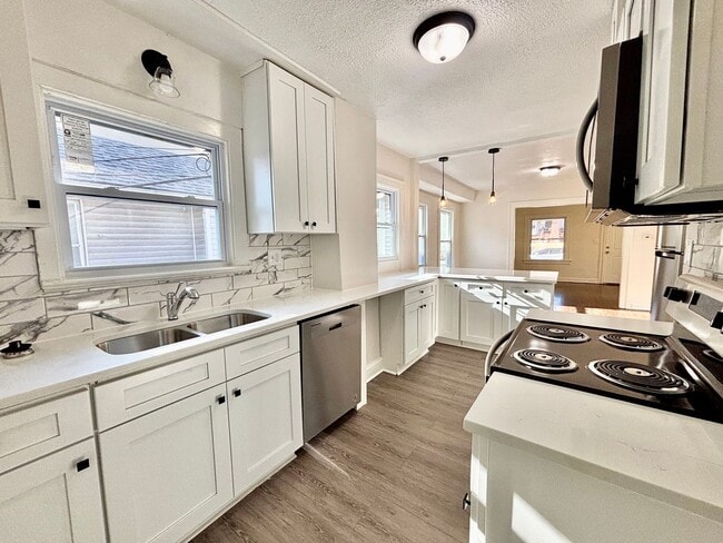 Building Photo - Fully Renovated 2-Bedroom Home with Back Deck, Basement & Off-Street Parking