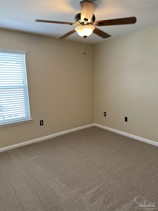 Building Photo - 6482 Flora Court