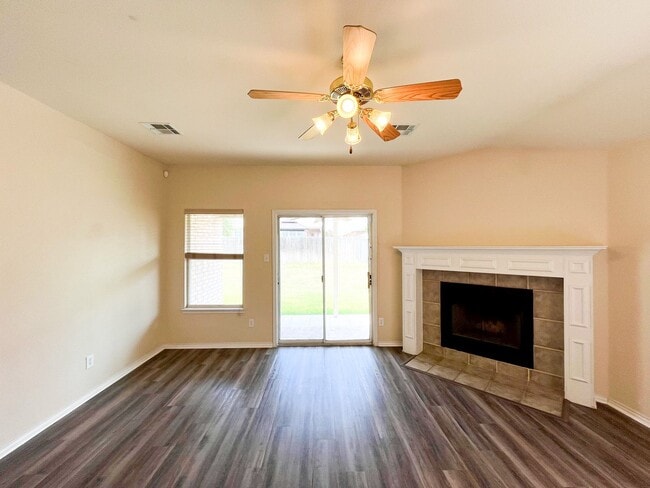 Building Photo - Available Now Beautiful 1 story, 4 bedroom, 2 bath, 2 car garage home with fire place, garage doo...