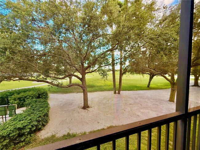 Building Photo - 200 Jacaranda Country Club Dr
