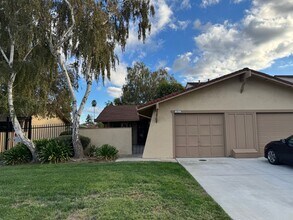 Building Photo - For Rent – Charming Woodland Condo with Co...