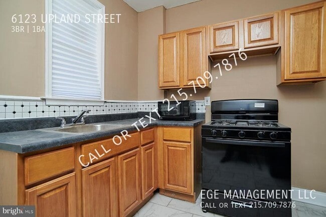 Building Photo - 6123 Upland St