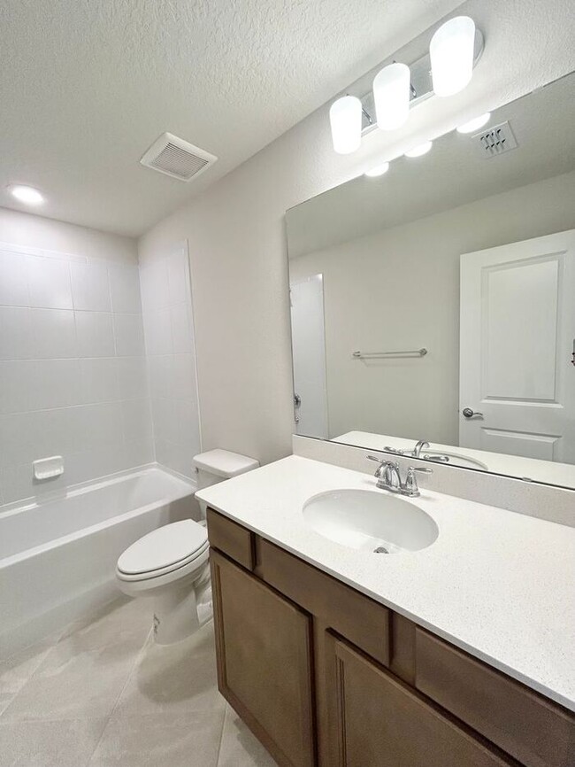 Building Photo - Brand New 4/3 Modern Townhome with a Priva...