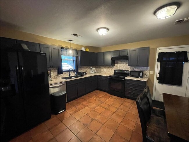 Building Photo - 940 E Guadalupe St