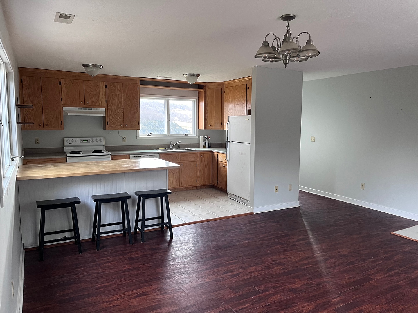 View into kitchen from living room. - 2353 Lusters Gate Rd