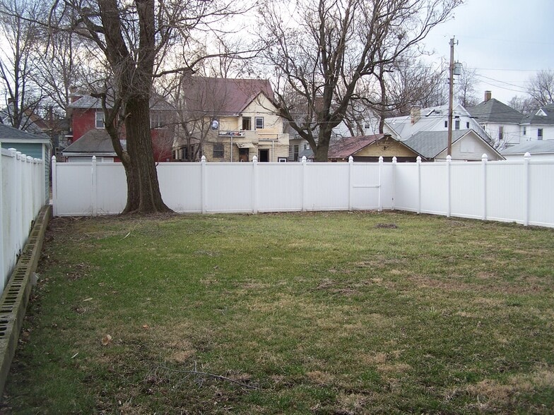 The back yard. Parking is behind this through the gate. - 1525 South 7th Street