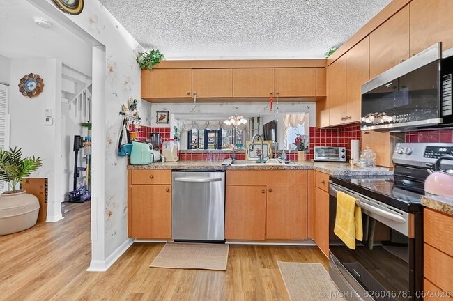 Building Photo - 4587 Carambola Cir S