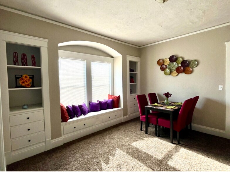 Built-ins, window seat, ample storage, carpeted. - 603 E 109th St