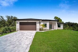 Building Photo - Single family for rent in Port Charlotte. New construction. 3+Den/ 2 bath. City water.