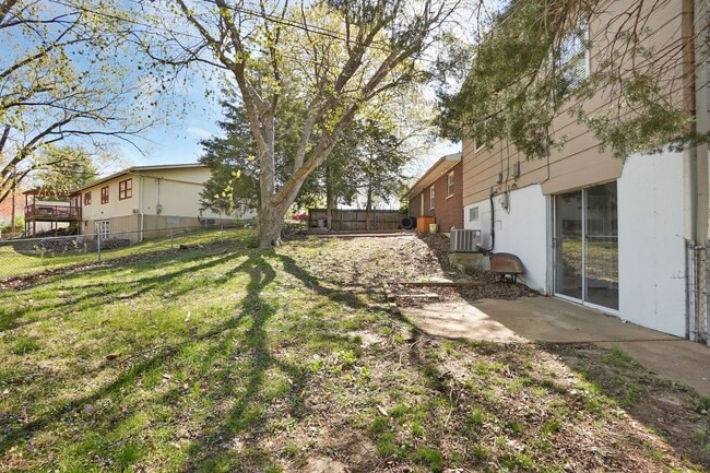 Building Photo - Spacious 4-Bedroom Home Near STL Airport i...